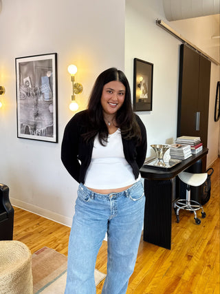 Rachelle Anne Hair, a hairstylist at Private Studio Hair Salon Toronto standing in the salon