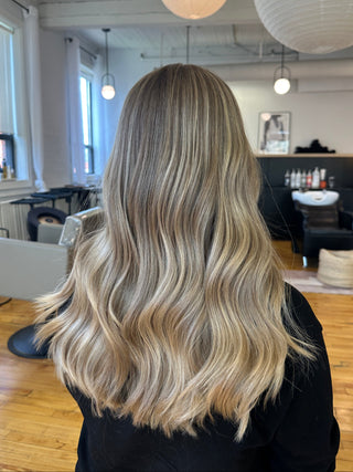 Lived-In blonde highlights by Richie Araish at Private Studio in Toronto's Fashion District.