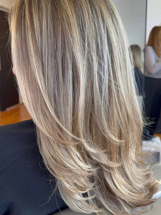 Lived-in blonde balayage by Priscilla Sorin at Private Studio in Toronto Fashion District
