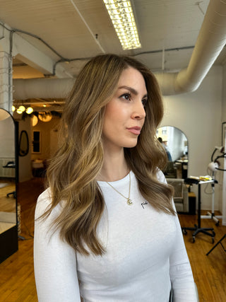 A Client with Sun-kissed, lived-in colour by Kristen Patterson at Private Studio in Toronto.