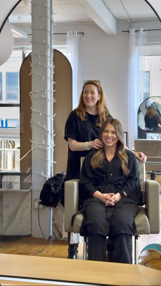 Kristen Patterson finishing a client's hair at Private Studio in Toronto.
