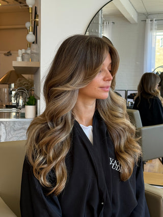 Beige Blonde lived-in highlights with curtain fringe by Kristen Patterson at Private Studio hair salon in Toronto's fashion district. 