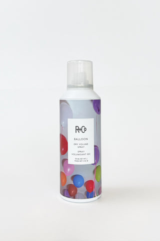 R+Co Balloon Dry Volume Spray texture spray bottle, showcasing the aerosol can for volumizing hair styling.