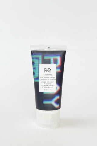 R+Co Cassette Curl Defining Masque in a jar, showcasing its rich texture for curl hydration and definition.