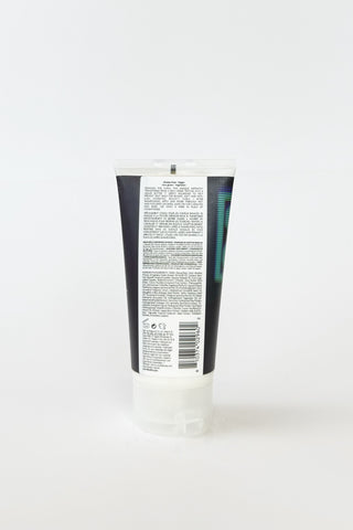 R+Co Cassette Curl Defining Masque in a jar, showcasing creamy hair mask for curl definition and hydration.